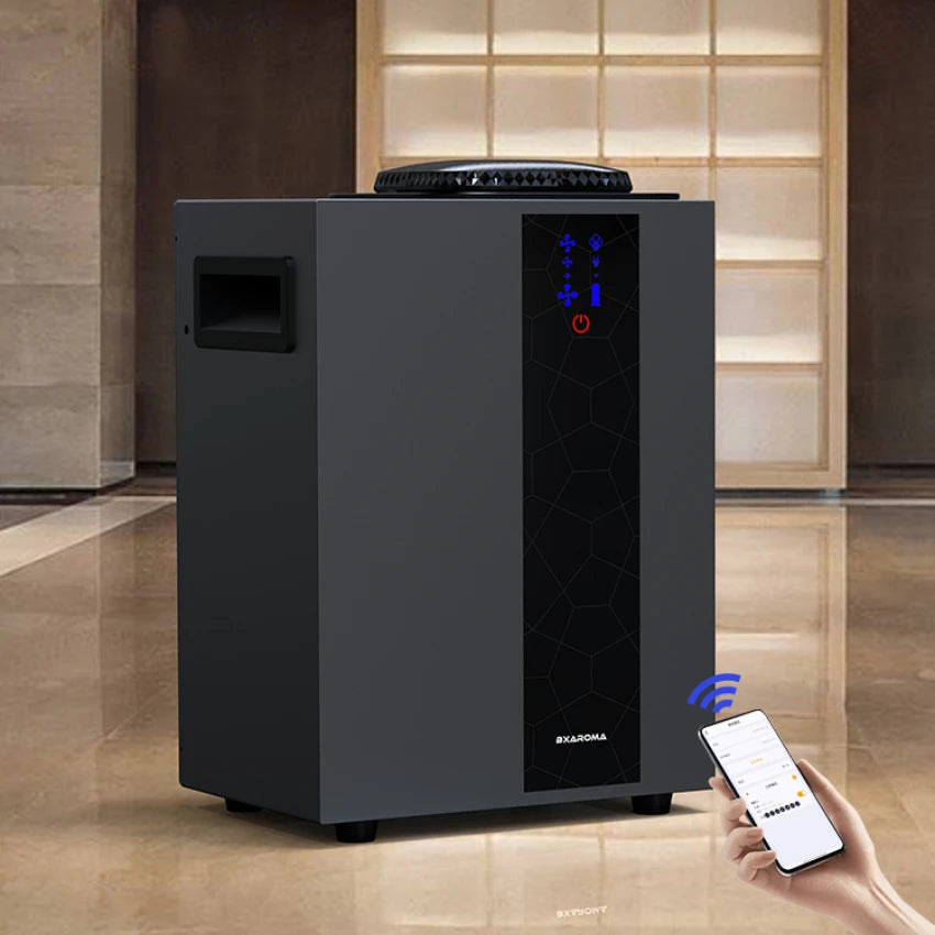 Black electronic device with digital display and Wi-Fi symbol, held by a hand with a smartphone in a modern indoor setting.